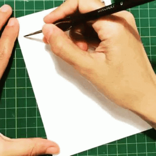 there are some hands on a piece of paper  paper