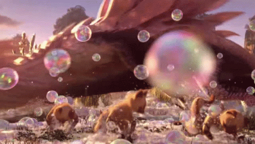 some animals are standing near some rocks and bubbles