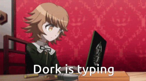 a girl with a black dress sits at her desk in front of the camera, text reads dork is typing