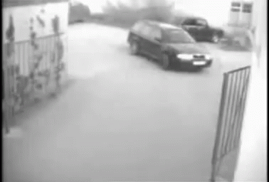 an automatic camera po of cars at gas station