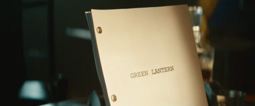 a white folder with a green lanfer sticker on it