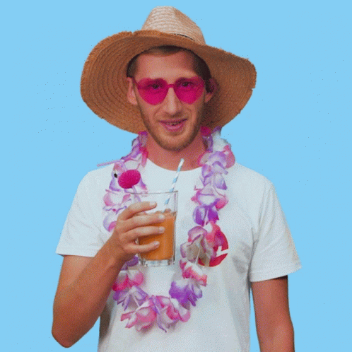 a young man is wearing a blue lei and drinking soing