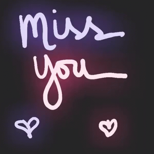 a purple sign that says miss you