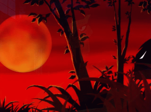 an orange bird sitting under a large blue moon