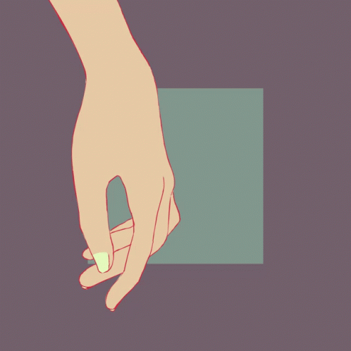 the hand is touching a small on on a grey surface