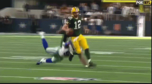 a football player is going after a football