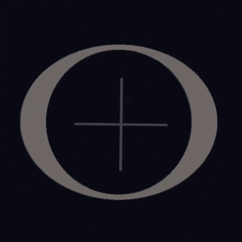 a cross sits in the middle of a white circular