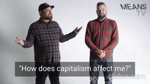 two men are dressed in plaid shirts and black pants, the one with a cap is talking