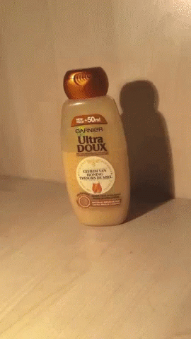 a bottle of sun defense spf deture