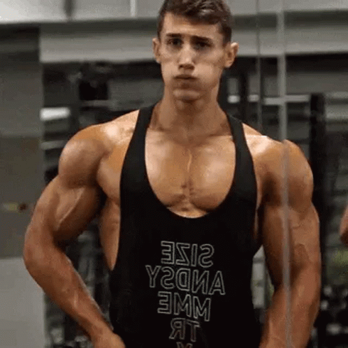 the bodybuilde competitor shows off his impressive six - pack abs