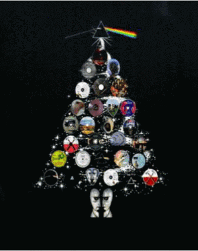 a christmas tree made out of cd's with space in the middle