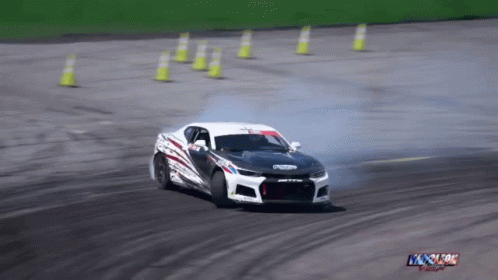 an extreme s of an automobile driving around a track