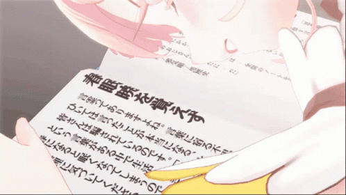 a close up of a person reading a paper