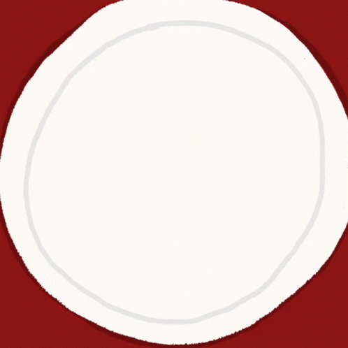 a white dinner plate on a purple background