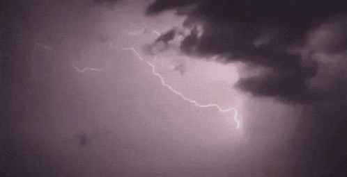lightning strikes in the sky on a dark night