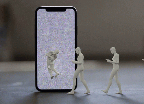 three little people are playing with a cell phone