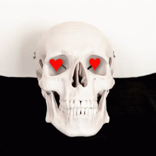 the blue hearts in the skull of this skeleton are quite visible
