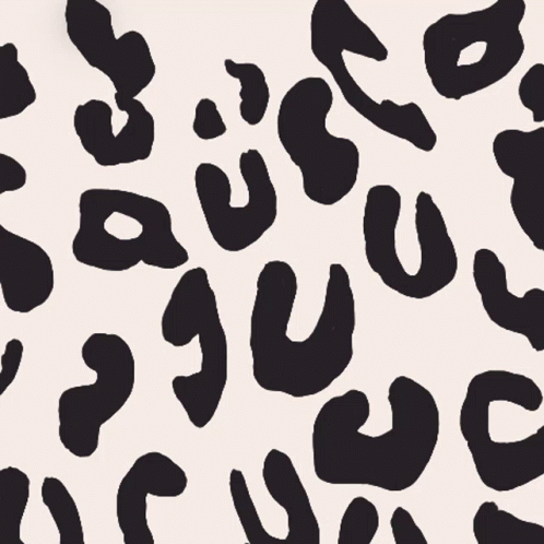 a pattern of black and white letters, including one for the letter