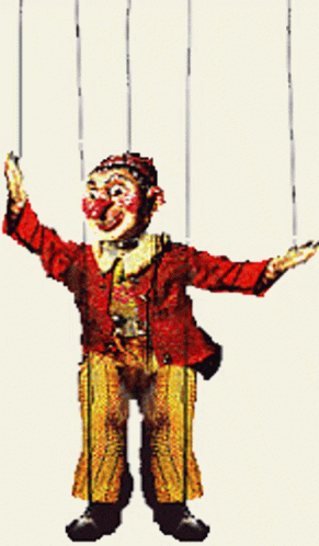 a clown is holding onto several strings that hang on hooks