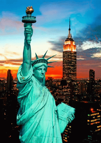 the statue of liberty has an orange sky