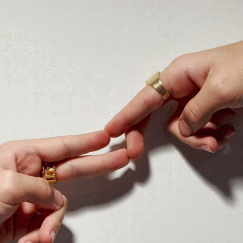 hands in a manikin make an interlock gesture