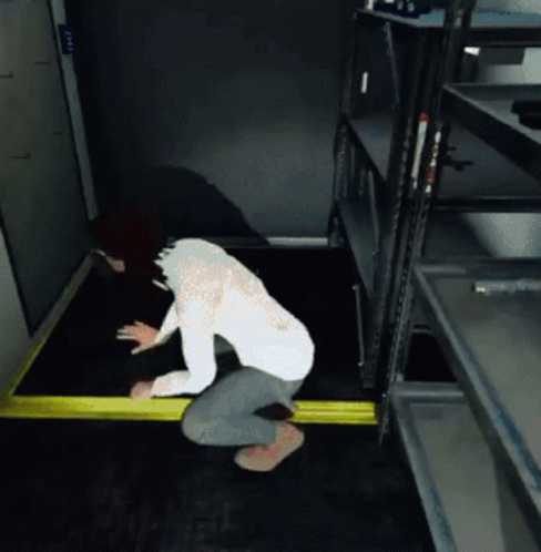 a person with their leg bent over the bottom of a platform in a room