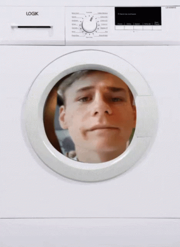 a man with a blue face behind a dryer