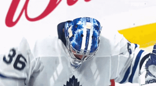 a hockey goalie's face on the back of his uniform