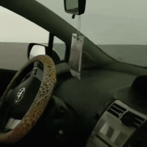 a steering wheel in the dashboard of a car