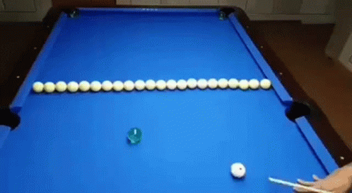 a pool table with a pair of glasses on it