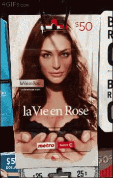 a woman's ad for la vie en rose on the phone