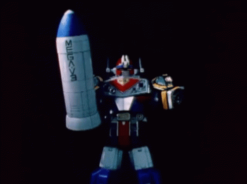 a toy robot holding a rocket that says nasa