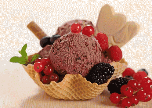 a bowl of blueberry and blue berry ice cream