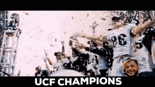 the ucf football team is all excited in the end zone of an ice - rink