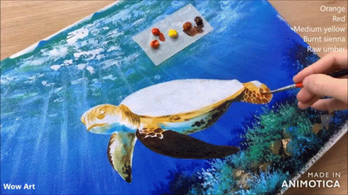 someone is painting an image of a sea turtle on paper
