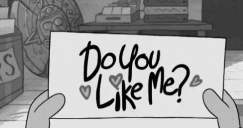 an animated character holding up a sign that says do you like me?