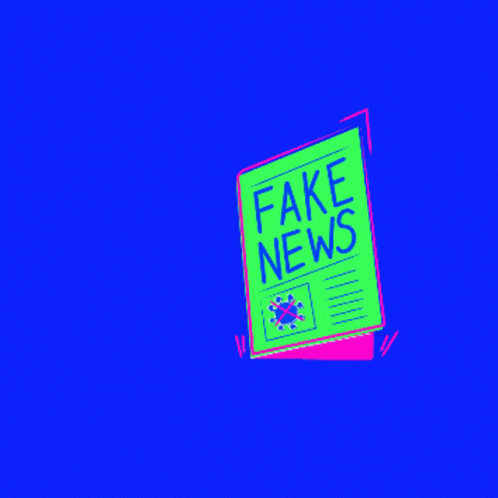 a red and green fake news sign hanging in the air