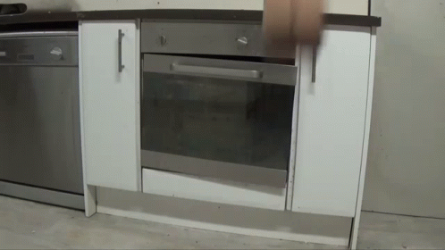 a stainless steel oven and microwave in a kitchen