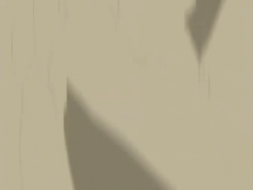 a shadow from the side of an umbrella in the rain
