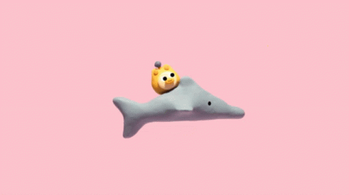 a 3d rendering of a plastic shark floating on purple