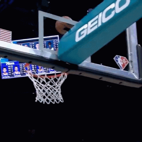 an object attached to a basketball hoop that has a score board