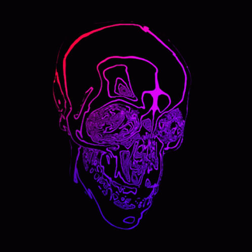 a purple skull is in the dark with pink light
