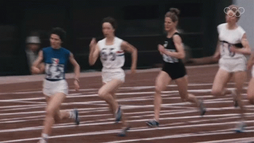 six athletes running together with one in the process
