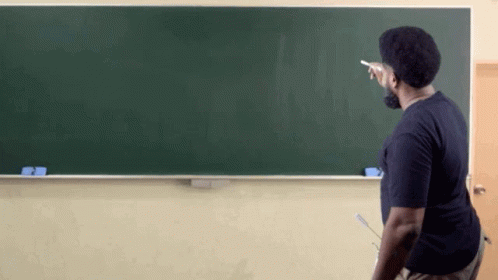 two men who are standing by a chalkboard
