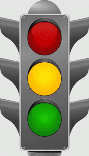 a stoplight with four colored lights on each one
