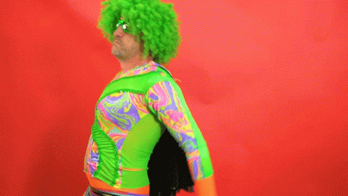 a man is dressed up as a psychedelic punk