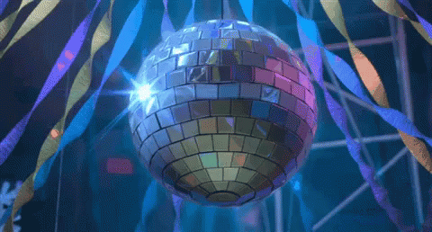 the lights shine brightly in a mirror ball