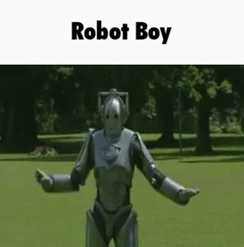 the robot boy is wearing an armor with a head like a human