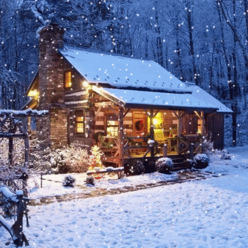 a home with snow falling on the ground