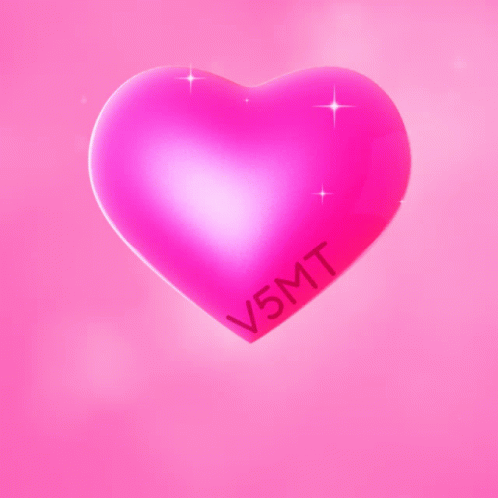 a pink heart with the word vm on it